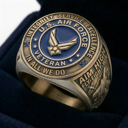 Bronze U.S. Air Force veteran ring with engraved text and emblem on a dark background
